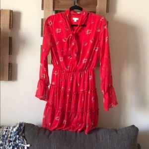 Lovely red dress with tie and ruffles